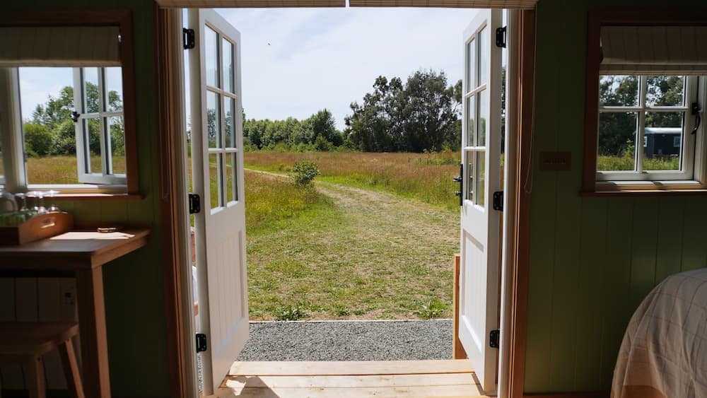 view through double doors to field