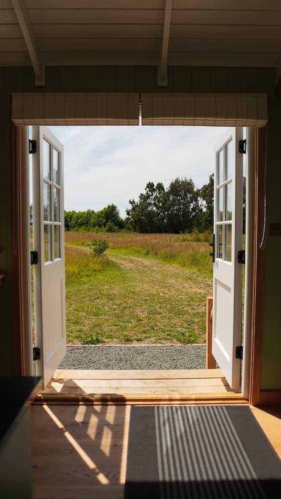 view through double doors to field